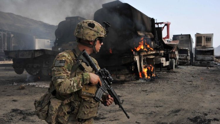 US and Taliban agree step on road to Afghan peace